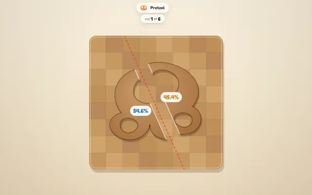 Fair Share: a pretzel cut into two halves on a chopping board